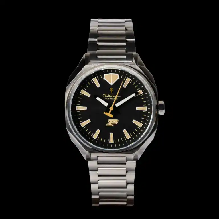 Fleddermann von Rieste Hanoverian Purdue Boilermaker Special Edition watch with black PVD case, gold dial, and steel bracelet